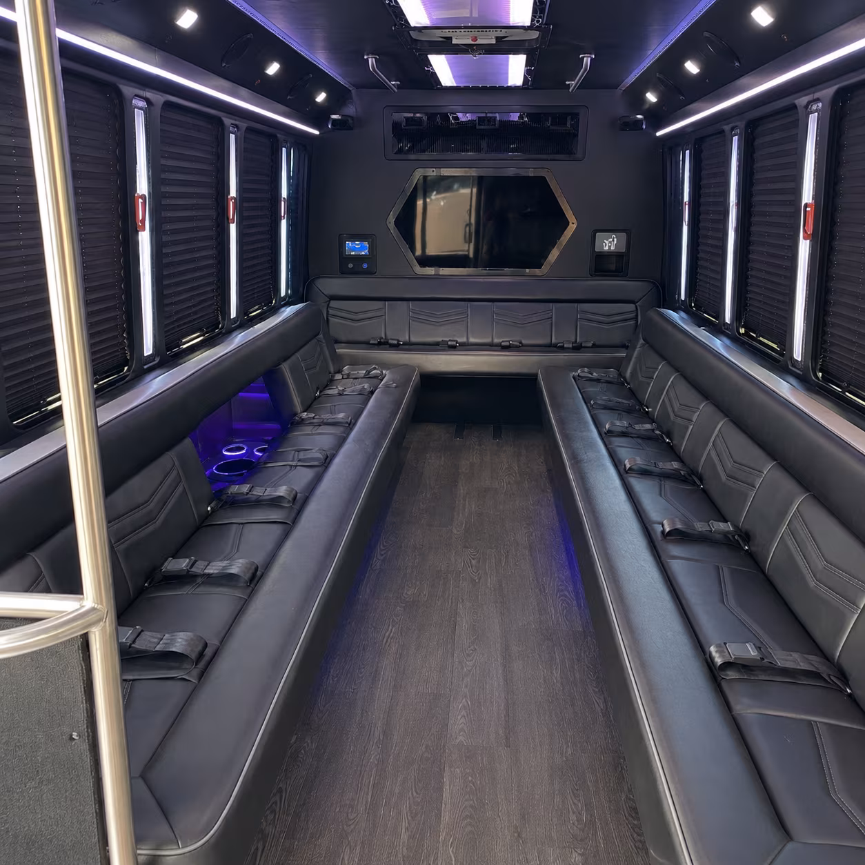 Group beside a Mercedes Sprinter limo in Baltimore